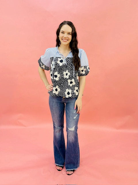 Floral print elasticized short sleeve top w/ double front tie closure