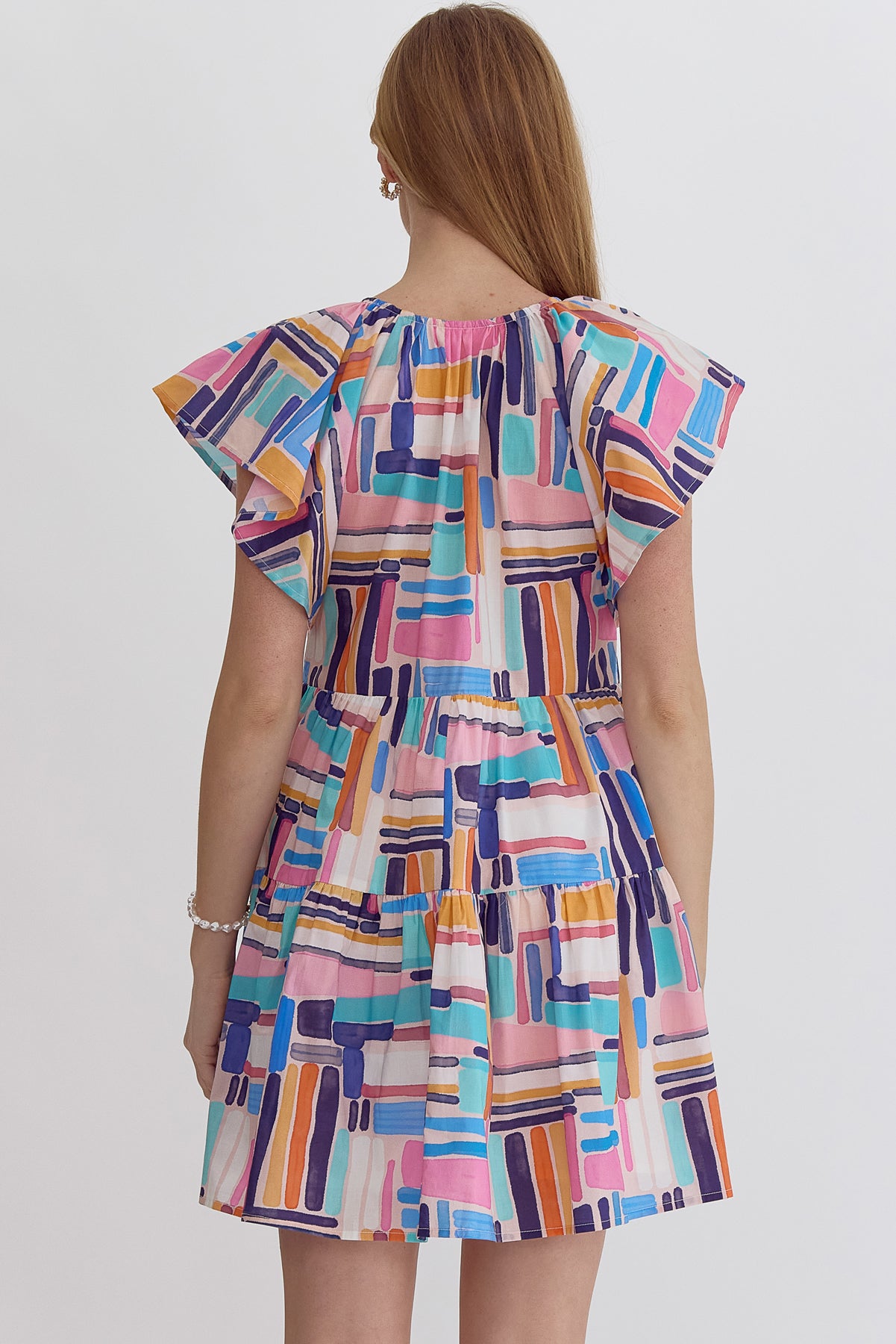 Printed v neck mini dress w/ ruffled sleeves & pockets