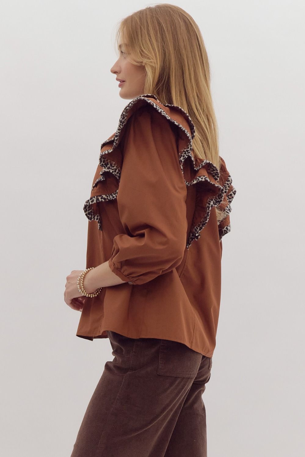 Solid long sleeve ruffled v-neck top w/ leopard print trim detail