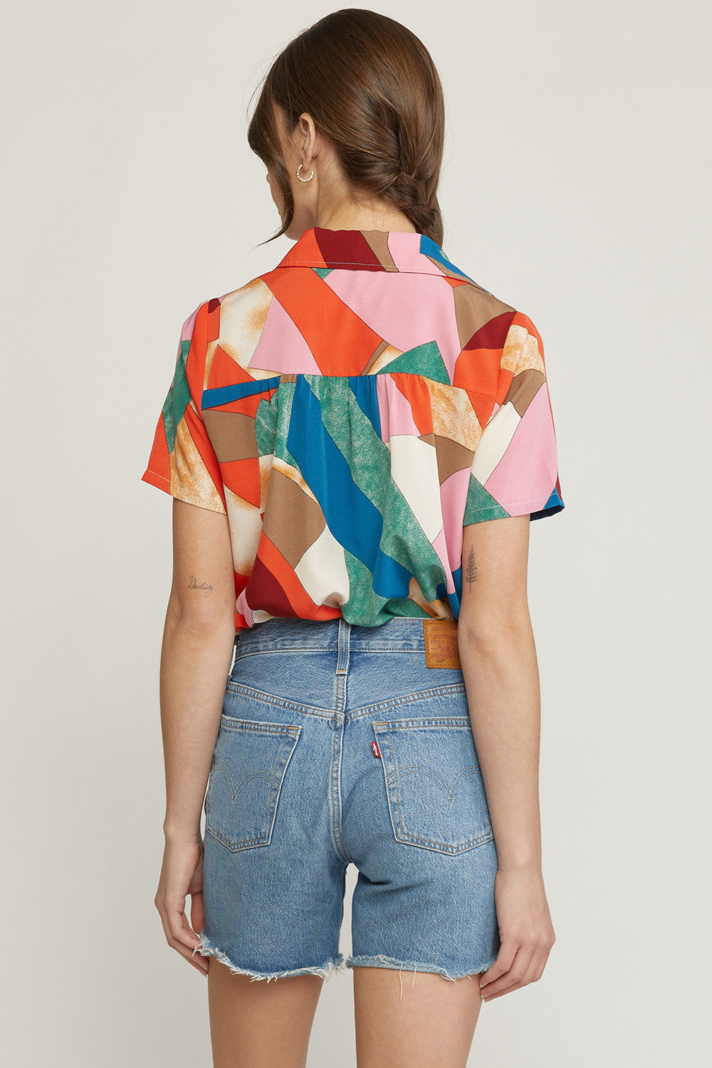 Printed Short Sleeve Faux Wrap Bodysuit with Button Closure At Bust