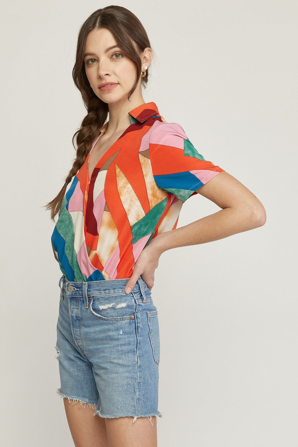 Printed Short Sleeve Faux Wrap Bodysuit with Button Closure At Bust