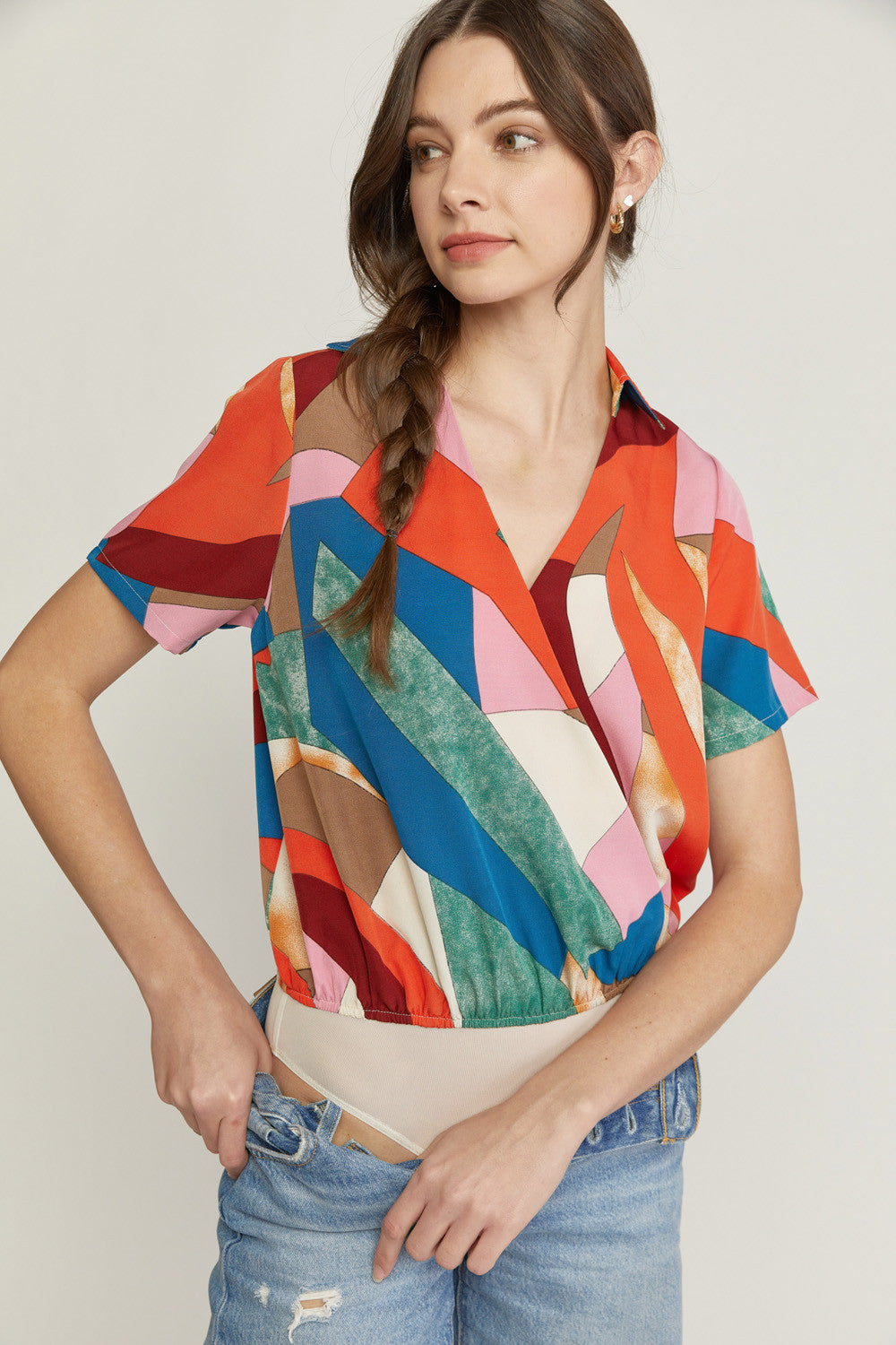 Printed Short Sleeve Faux Wrap Bodysuit with Button Closure At Bust