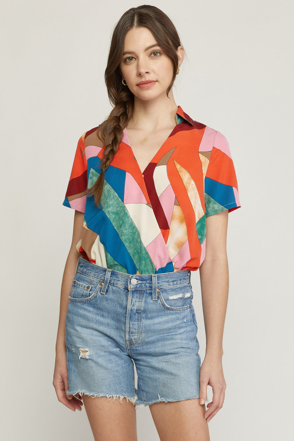 Printed Short Sleeve Faux Wrap Bodysuit with Button Closure At Bust