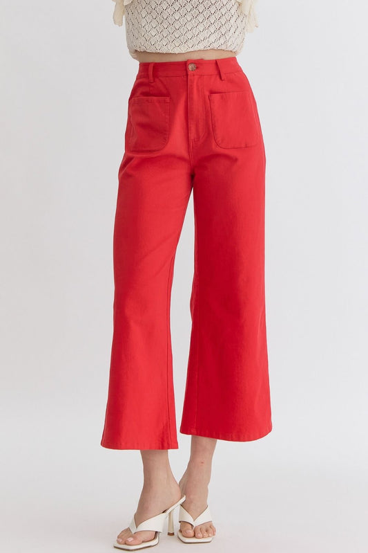 High waisted wide legs pants w/ pockets at front faux pockets at back. Zipper closure at front