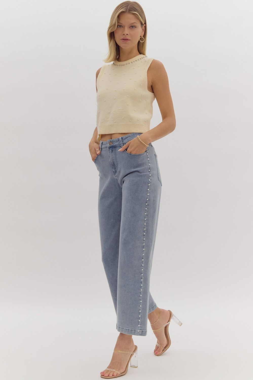 High waisted denim wide leg pants w/ pearl details @ side. Pockets @ front & back. Zipper.