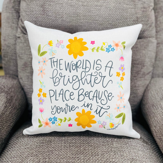 The world is a brighter place because you’re in it square pillow