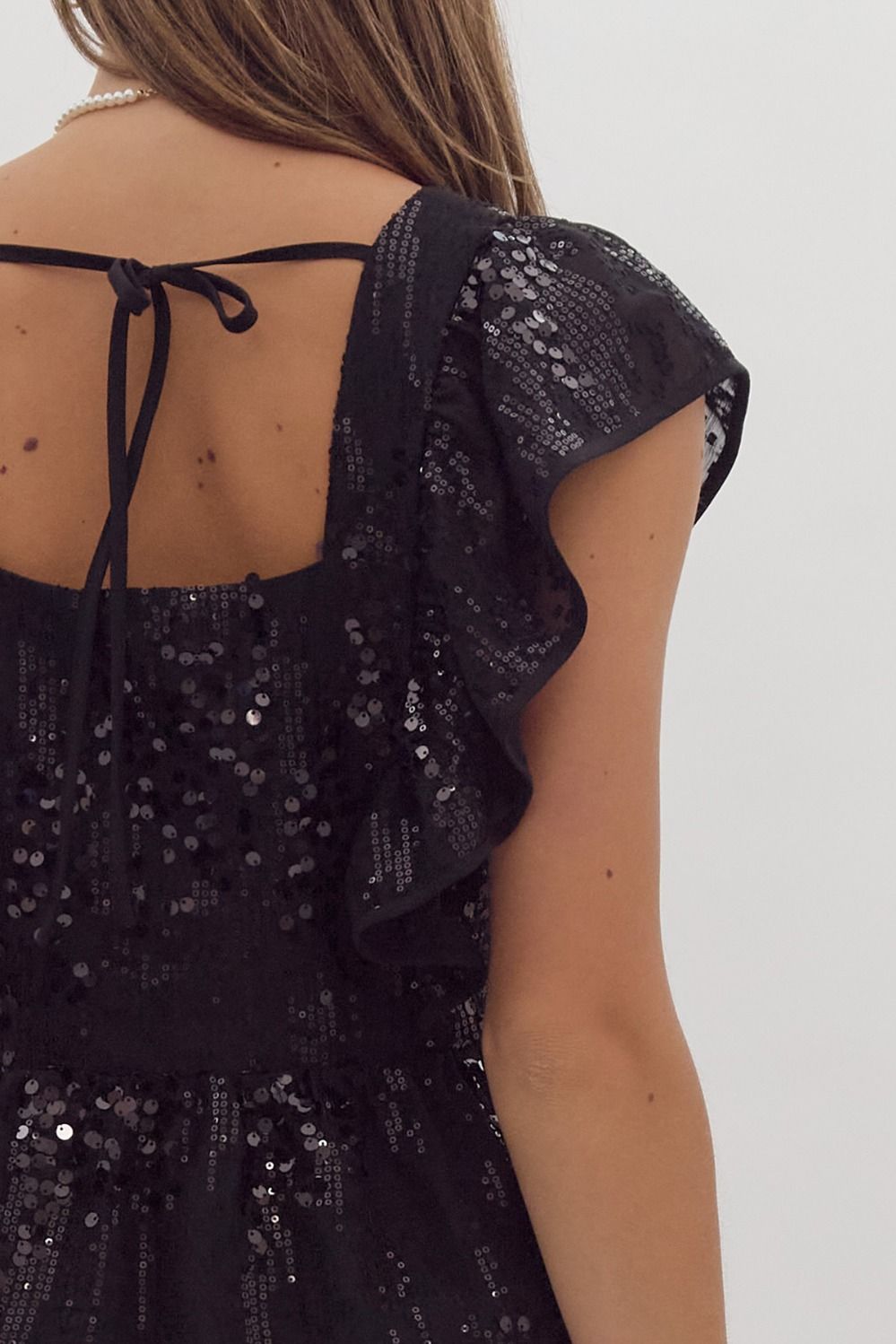 Sequin Ruffle sleeve square neck crop top w/ self tie at back