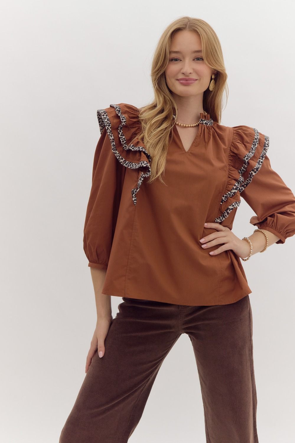 Solid long sleeve ruffled v-neck top w/ leopard print trim detail