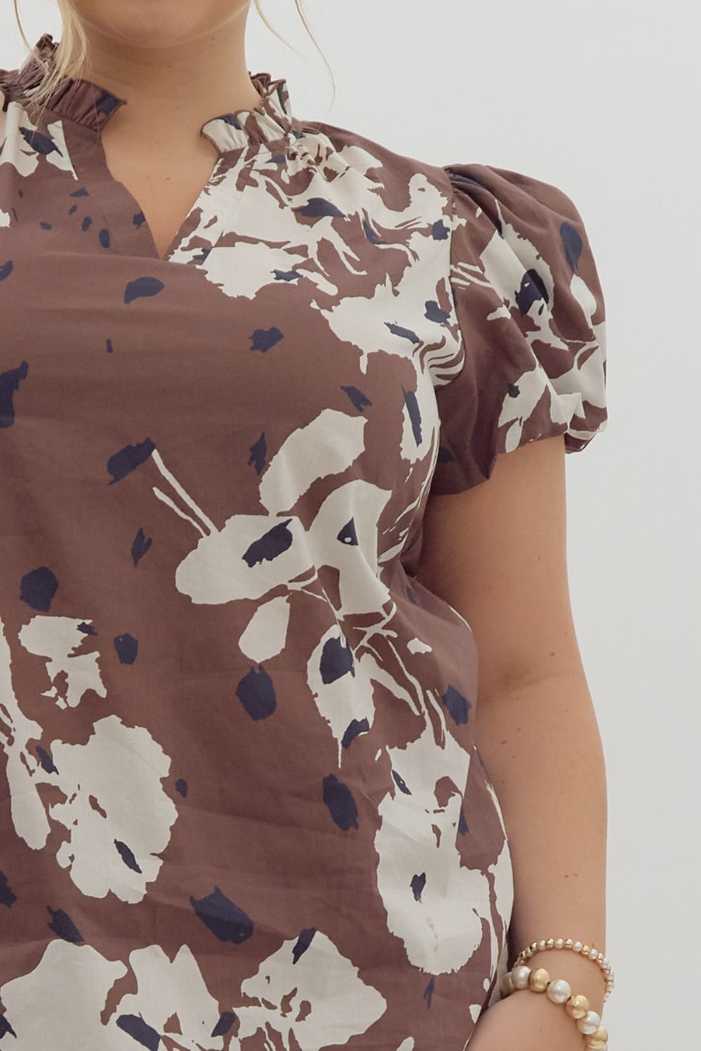 Printed short puff sleeve v-neck top w/ ruffled neckline