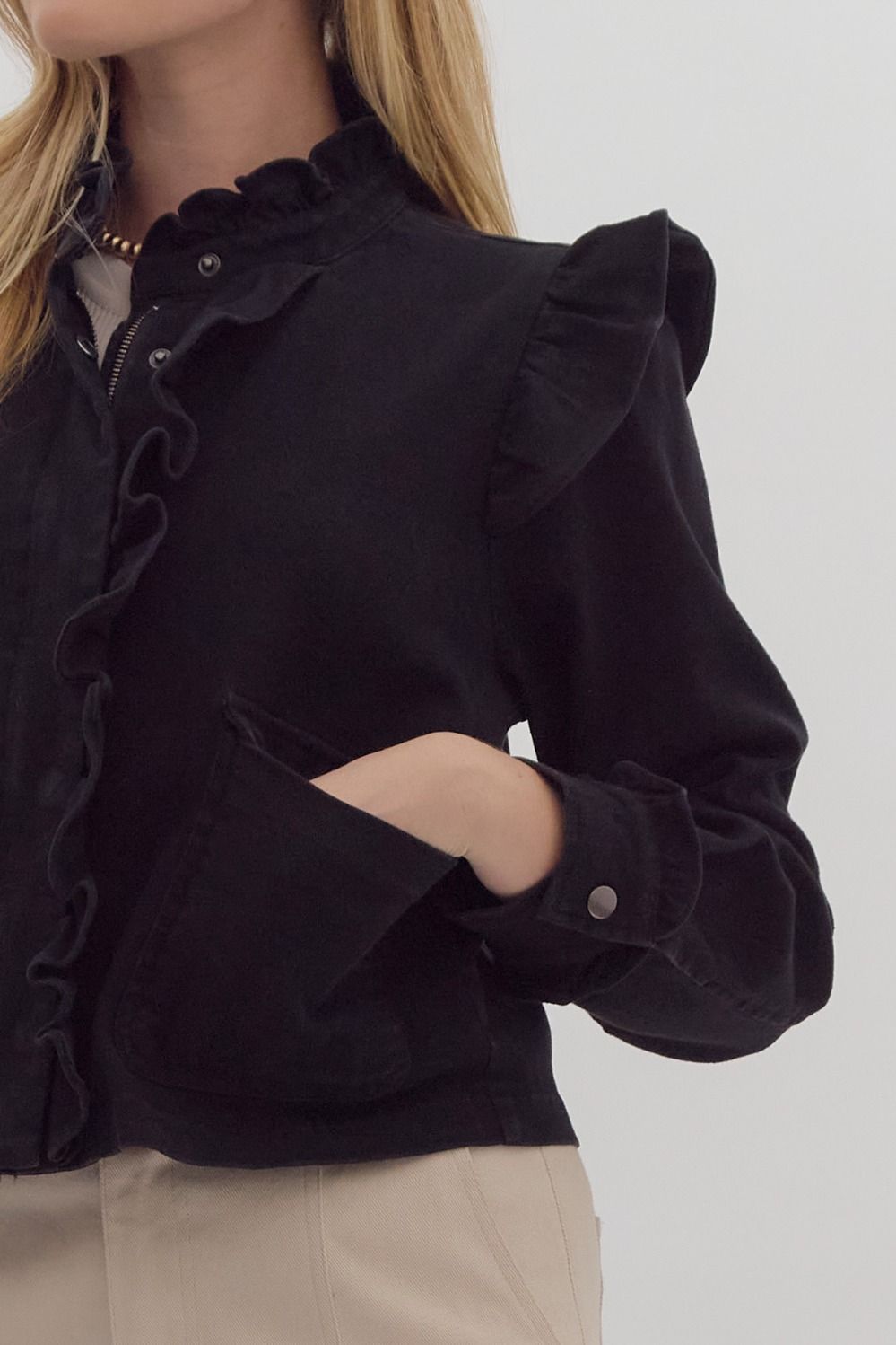 Solid cropped zip-up utility jacket w/ Ruffle detail. Pockets. Snap buttons
