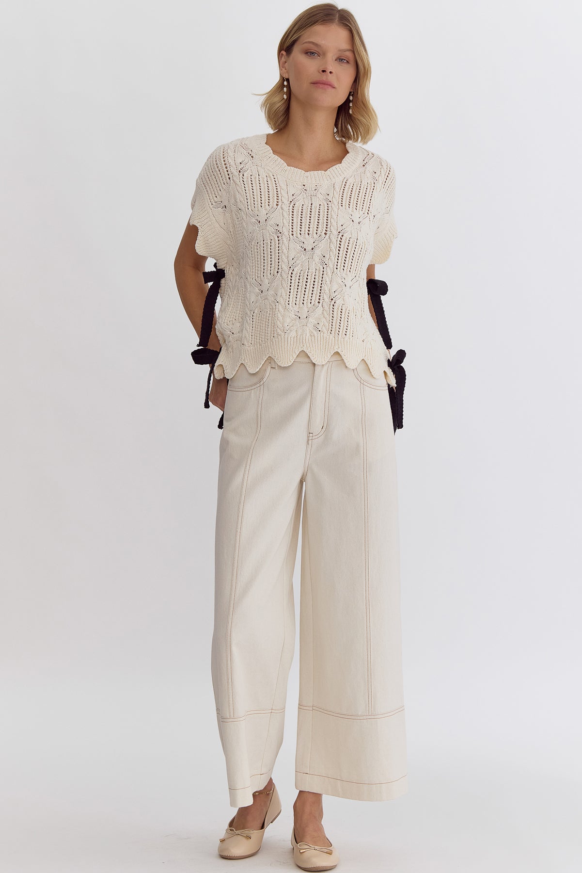 Crochet knit short sleeve crop top w/ scalloped hem self tie bow detail at sides