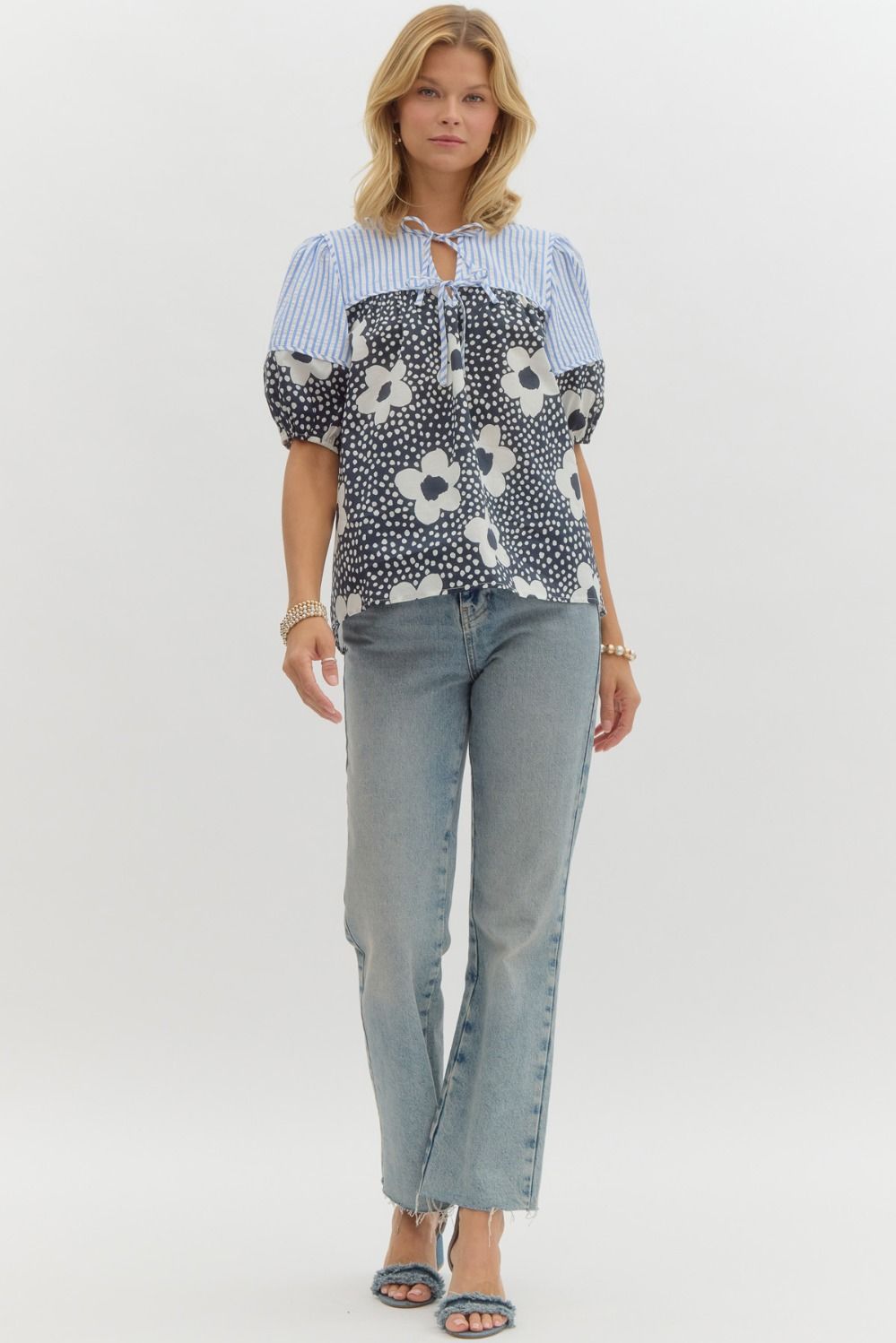 Floral print elasticized short sleeve top w/ double front tie closure
