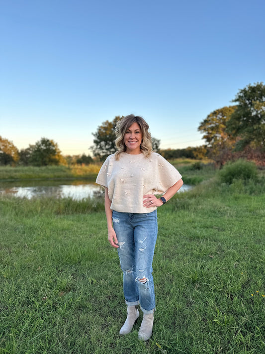 Solid knit short sleeve sweater top w/ bow & pearl embellishments