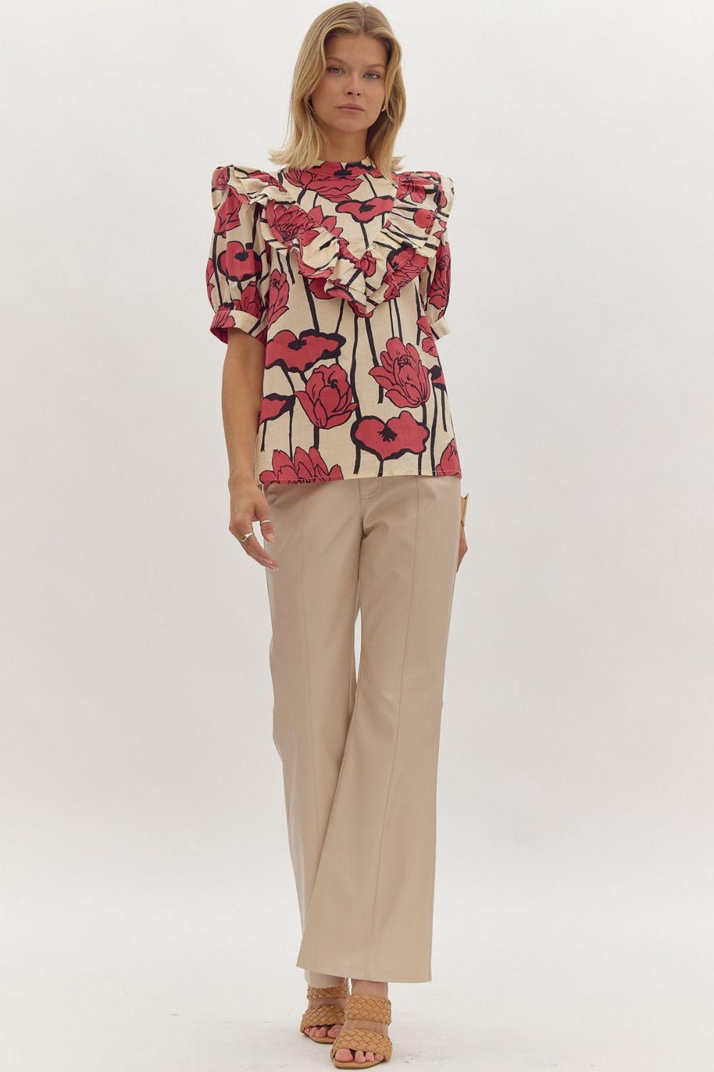 Floral print, mock neck short sleeve top w/ Ruffle overlay detail. Button at back