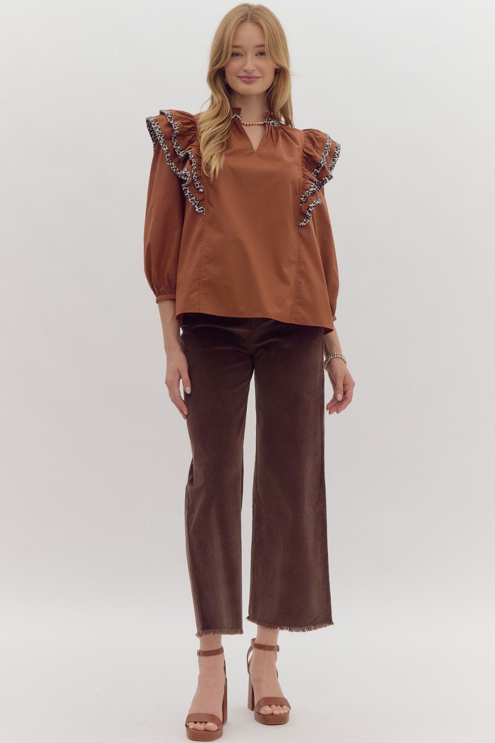 Solid long sleeve ruffled v-neck top w/ leopard print trim detail