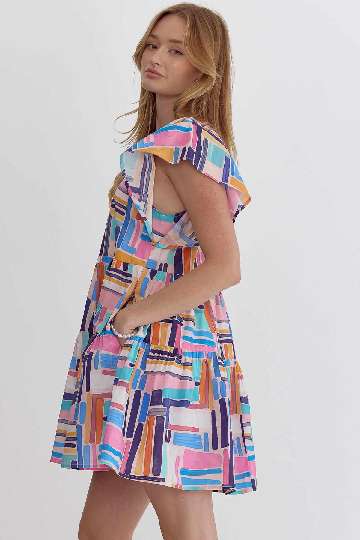 Printed v neck mini dress w/ ruffled sleeves & pockets