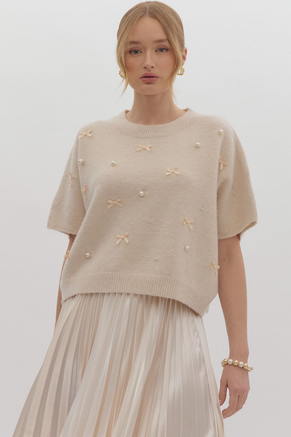 Solid knit short sleeve sweater top w/ bow & pearl embellishments