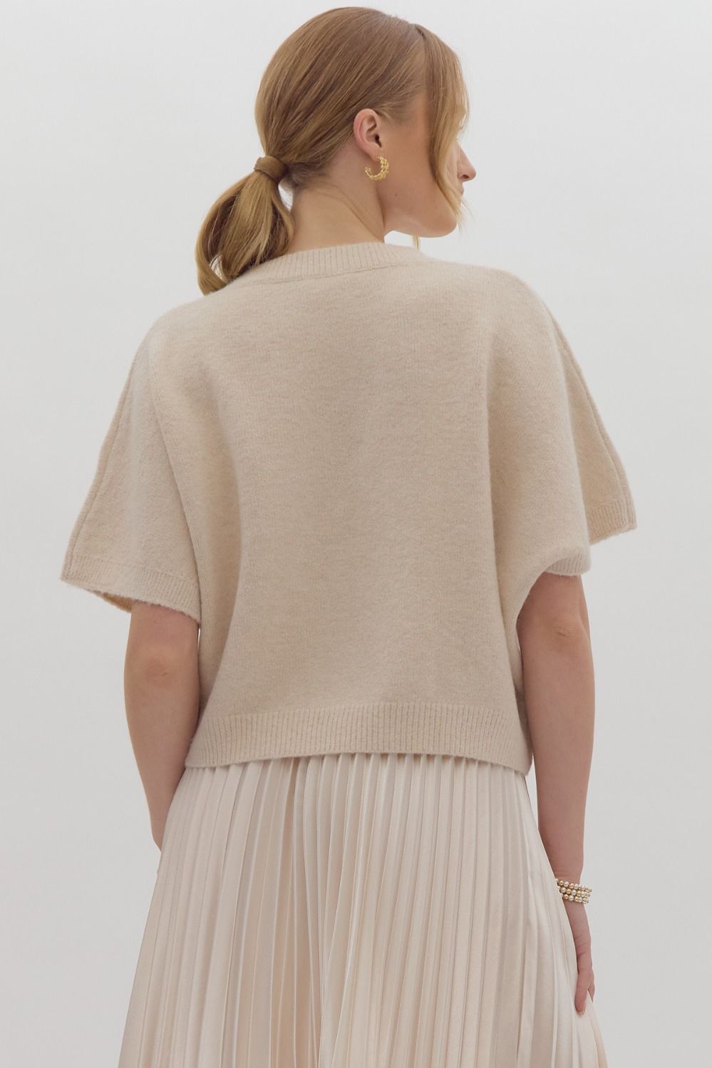 Solid knit short sleeve sweater top w/ bow & pearl embellishments