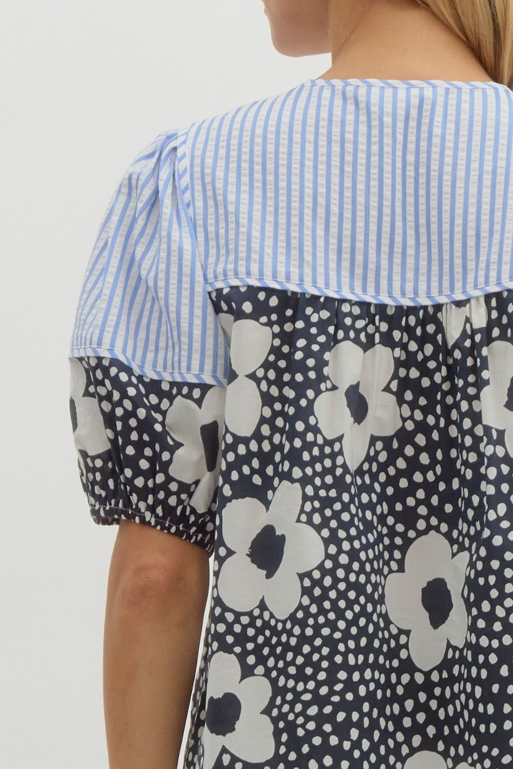 Floral print elasticized short sleeve top w/ double front tie closure