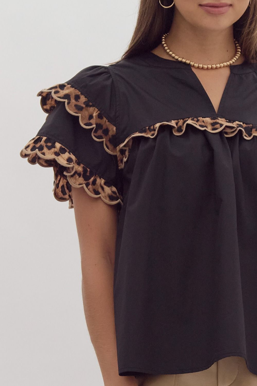 Solid tiered short sleeve v neck top w/ contrasting scalloped cheetah print trim detail