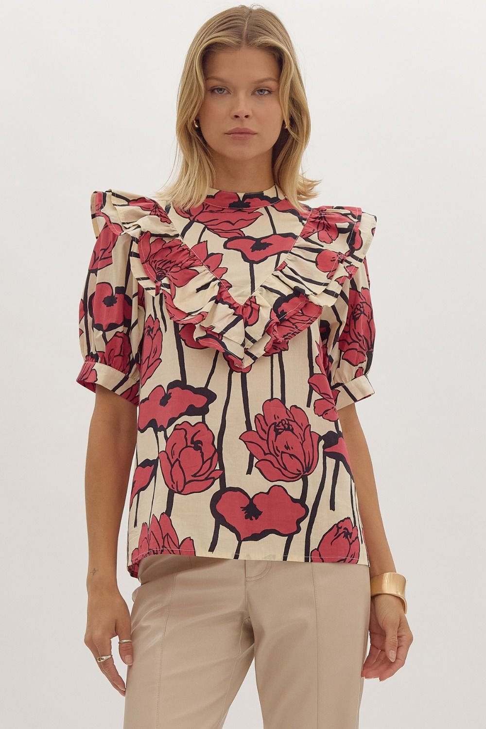 Floral print, mock neck short sleeve top w/ Ruffle overlay detail. Button at back